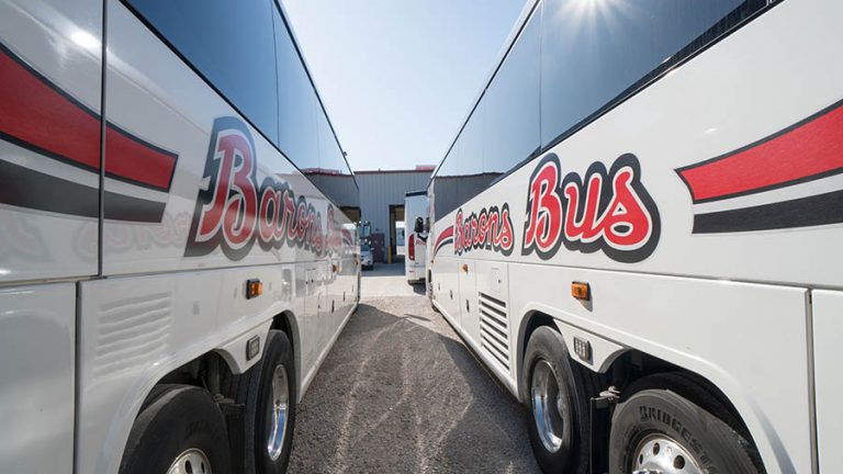 barons bus our fleet exterior two buses perspective converging